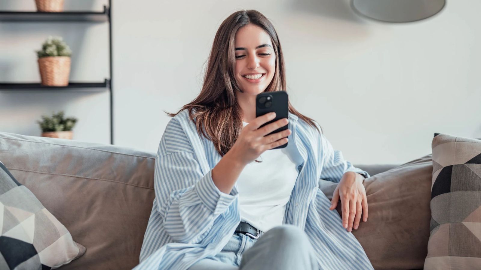 woman holding phone